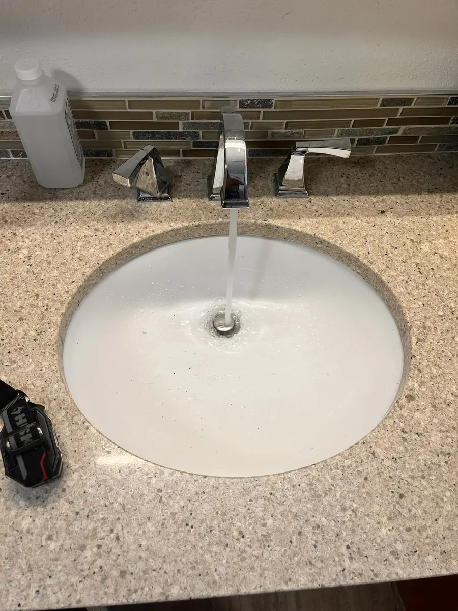 Bathroom faucet running cleanly after repair